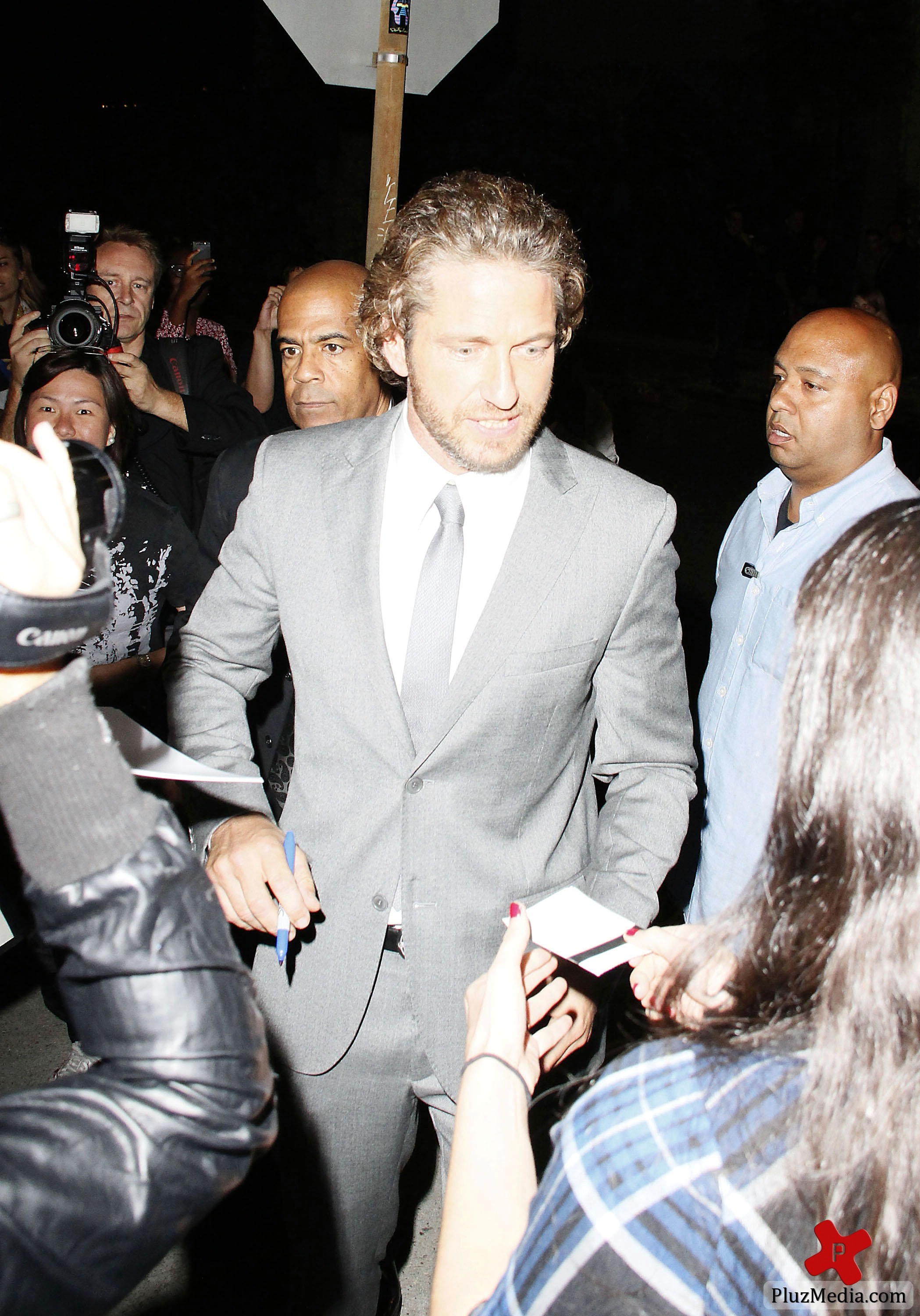 Gerard Butler signs autographs for fans at the 'Machine Gun Preacher' premiere | Picture 84219